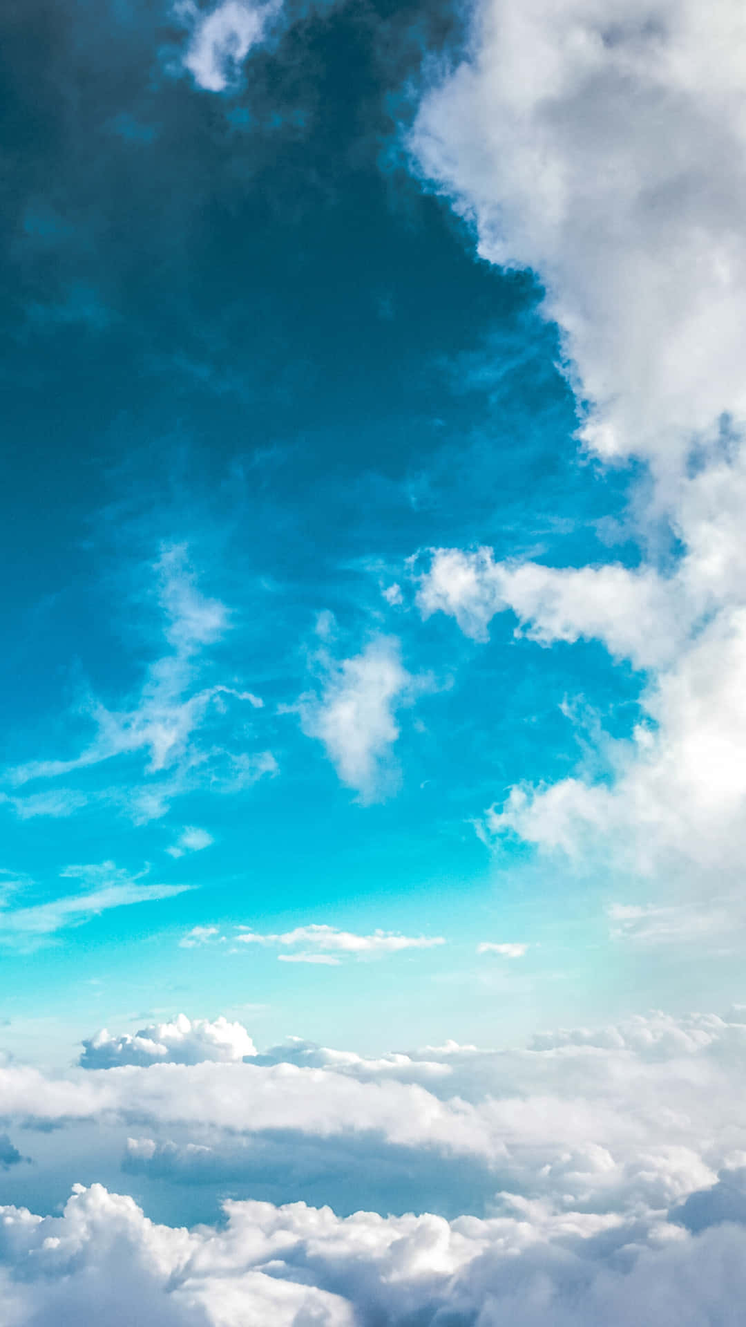 Serene Blue Skyand Clouds Wallpaper
