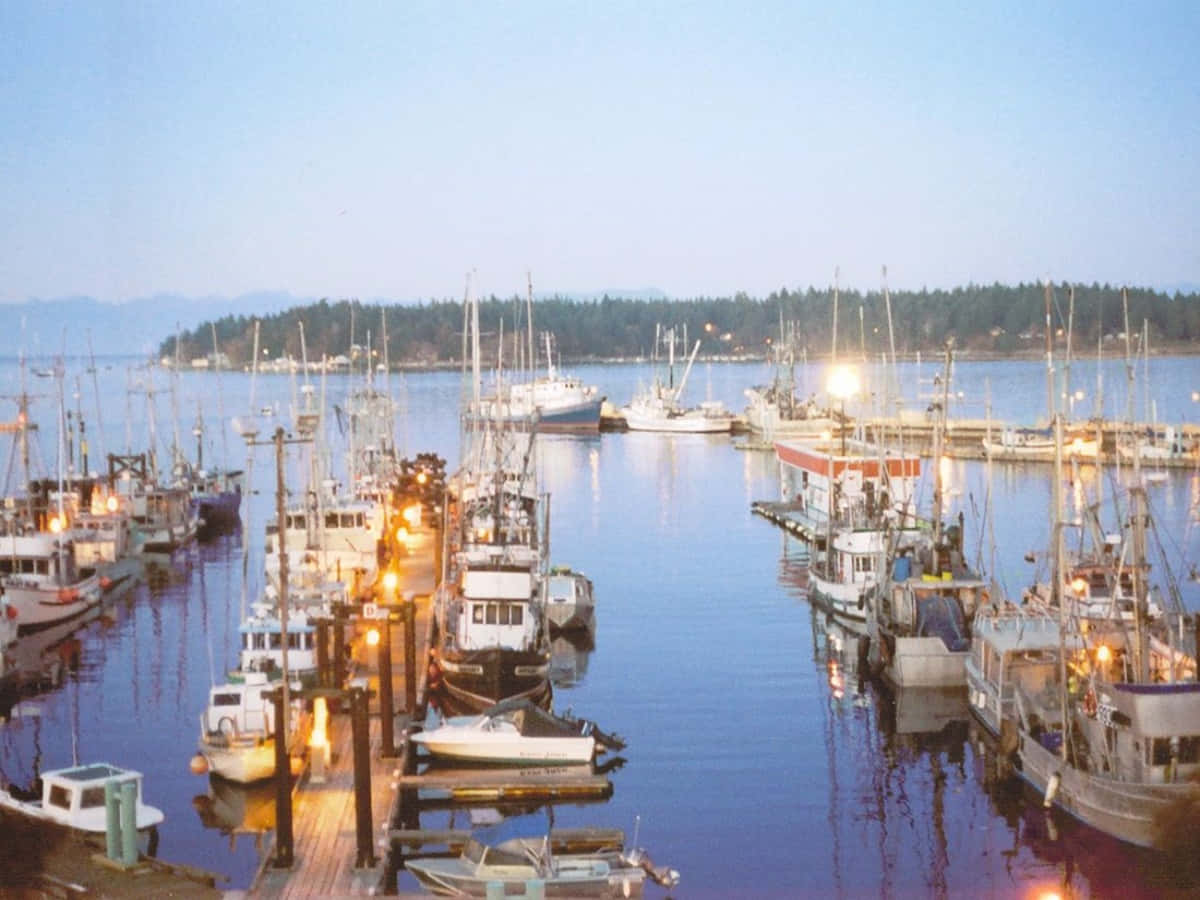 Serene Coastal View Showcasing A Stunning Sunset In Nanaimo, British Columbia. Wallpaper