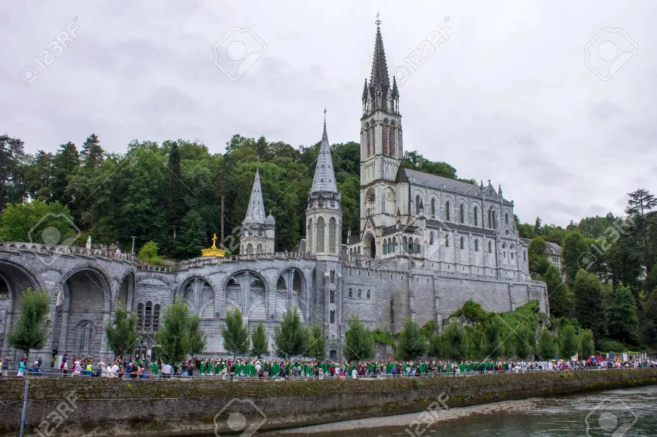 Serene Evening View Of The Lourdes Sanctuary Wallpaper