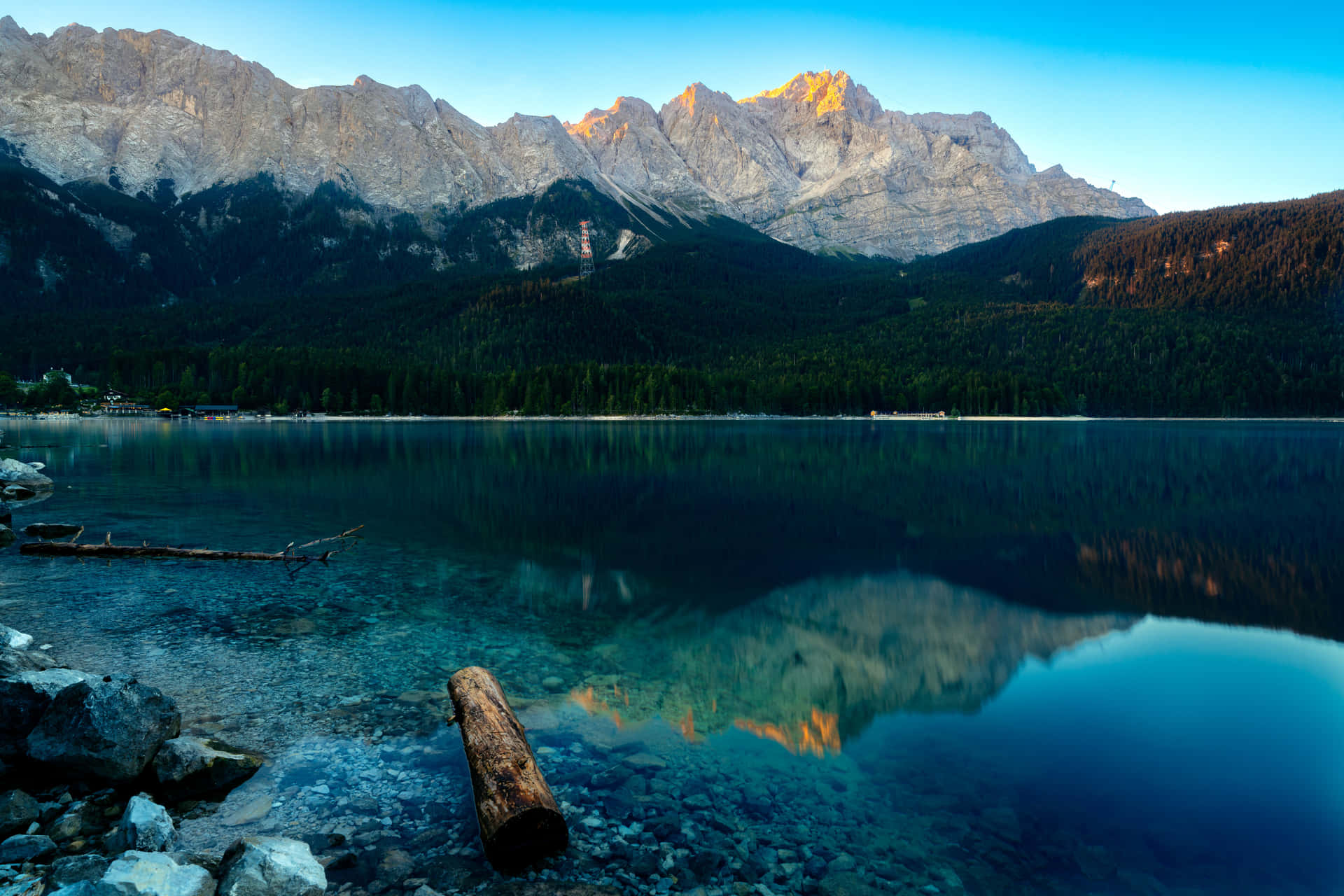 Serene Landscape Of The Crystal Clear 4k Lake Wallpaper