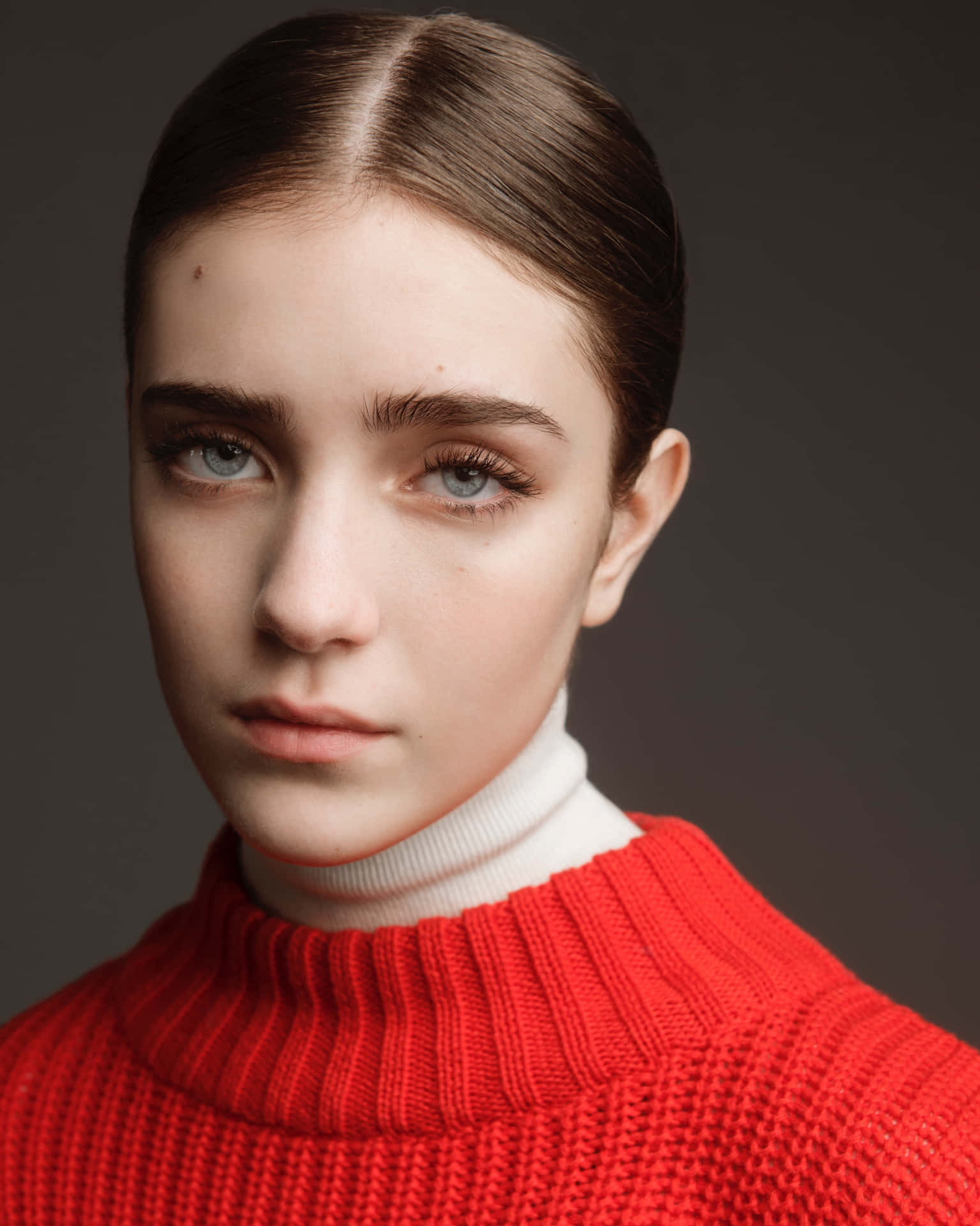 Serious Expression Portrait Red Sweater Wallpaper