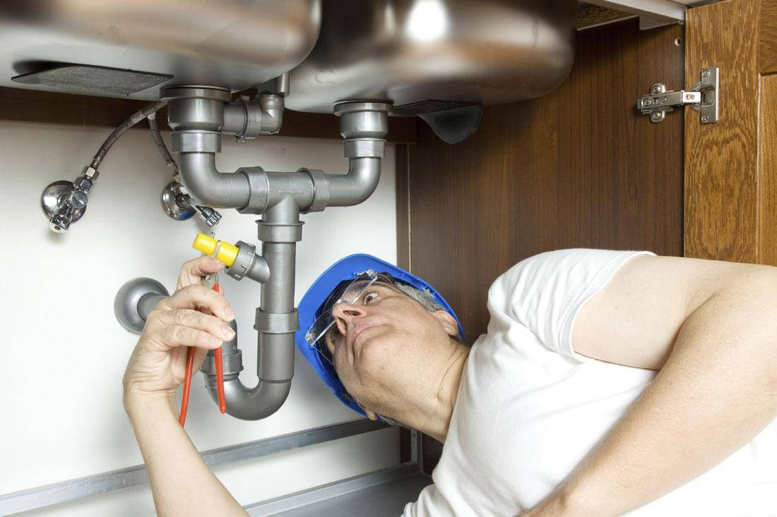 Service Plumber Fixing Sink Pipes Wallpaper