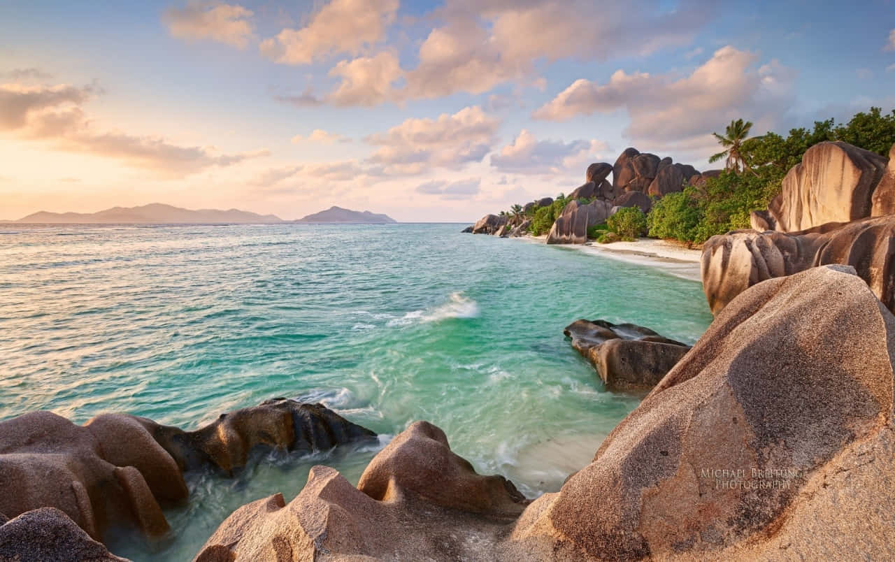 Serene Seychelles Beach - Stunning Tropical Escape Wallpaper
