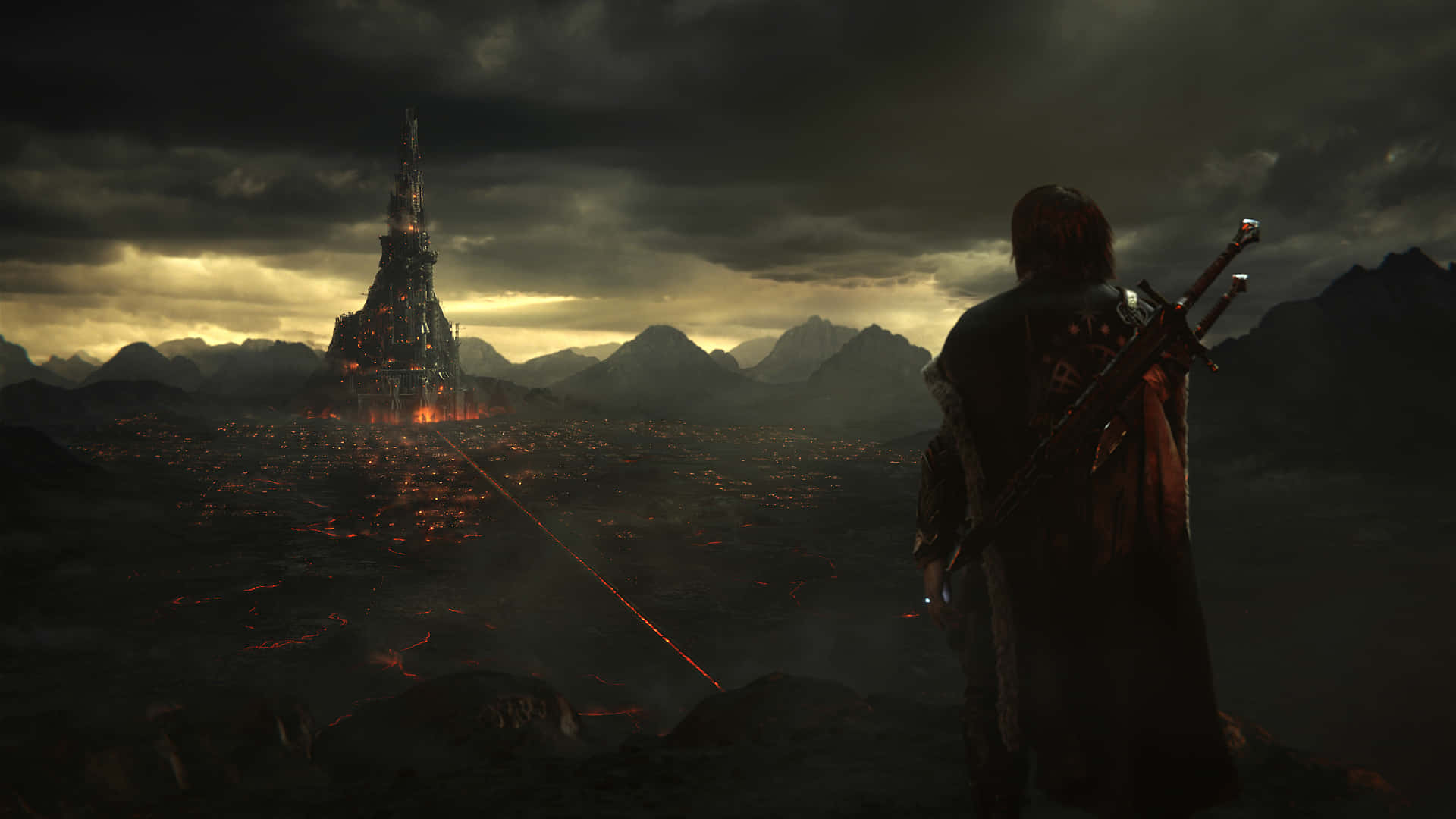 A Man Is Standing On A Mountain Looking At The Tower Of The Lord Of The Rings