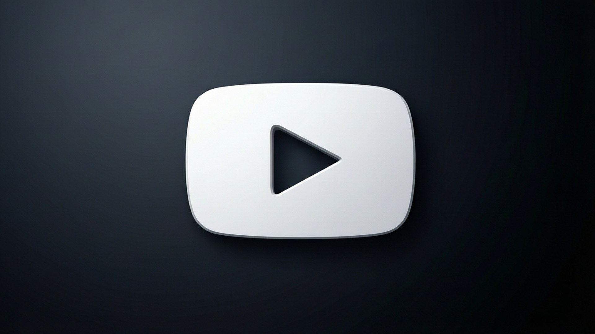 Hvitt YouTube-logo med skygge på mørk gradient.