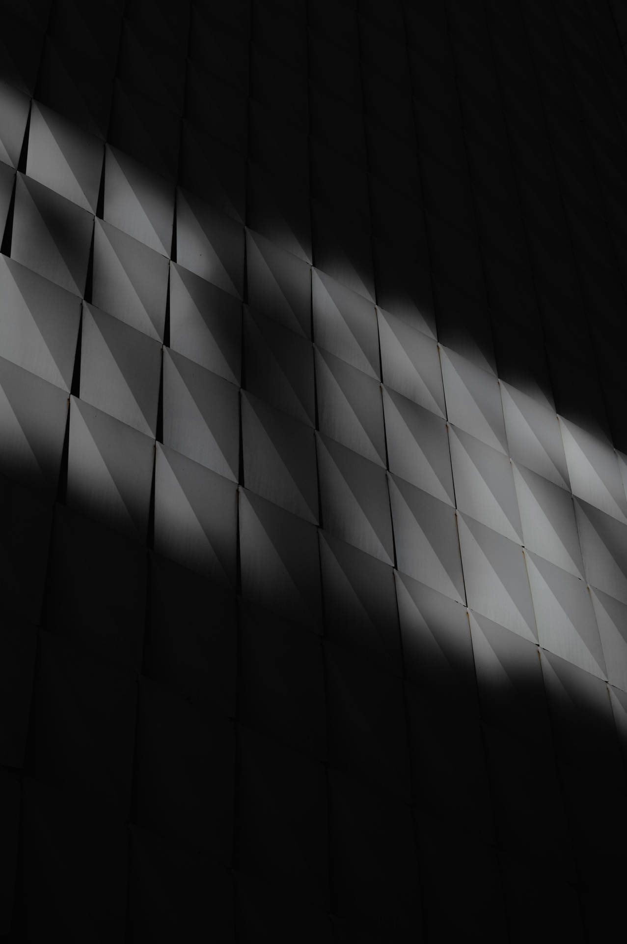 Shadowy Dark Wall Of Squares Wallpaper