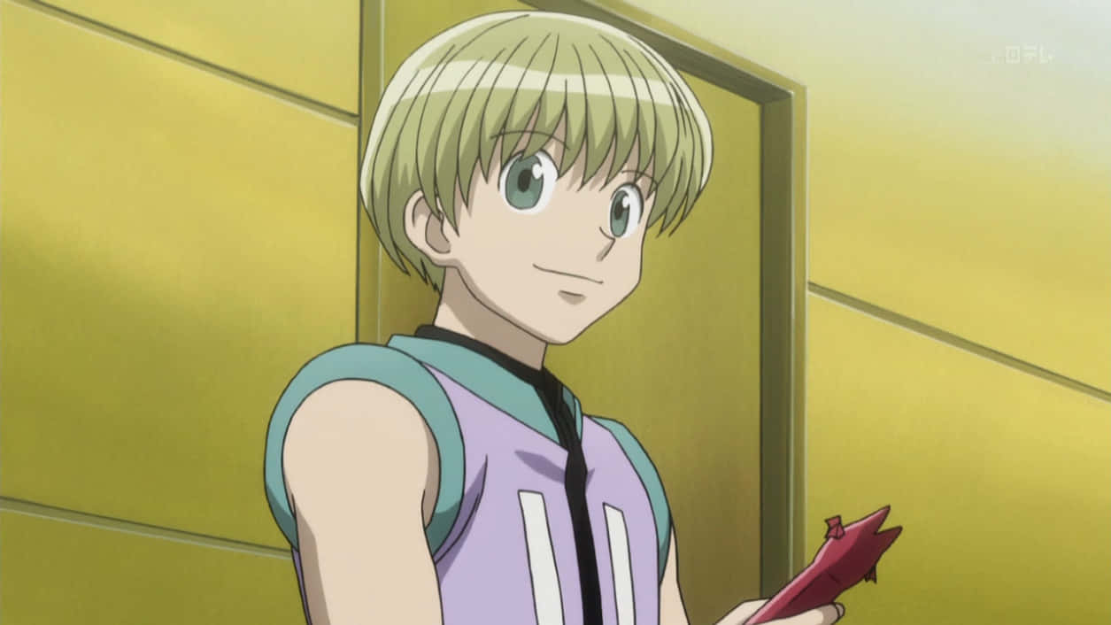 Shalnark from Hunter x Hunter anime, smiling with his controller in hand. Wallpaper