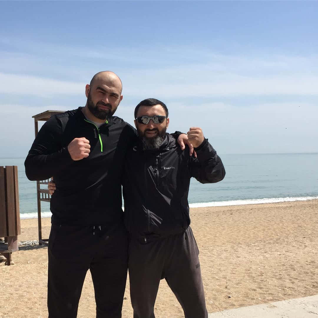 Shamil Abdurakhimov And Friend Doing Fist Pumps Background
