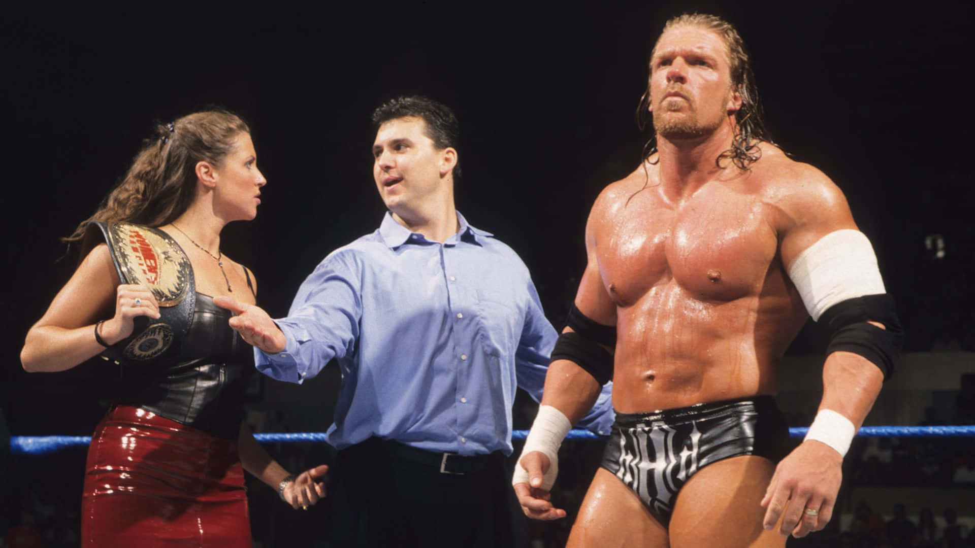 Shane McMahon med Stephanie McMahon og Triple H Tapet Wallpaper