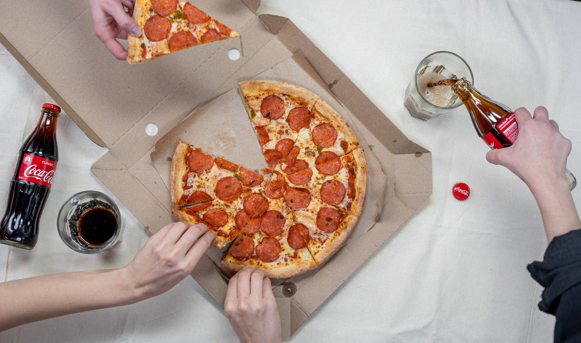 Sharing Dominos Pizza Top View Wallpaper