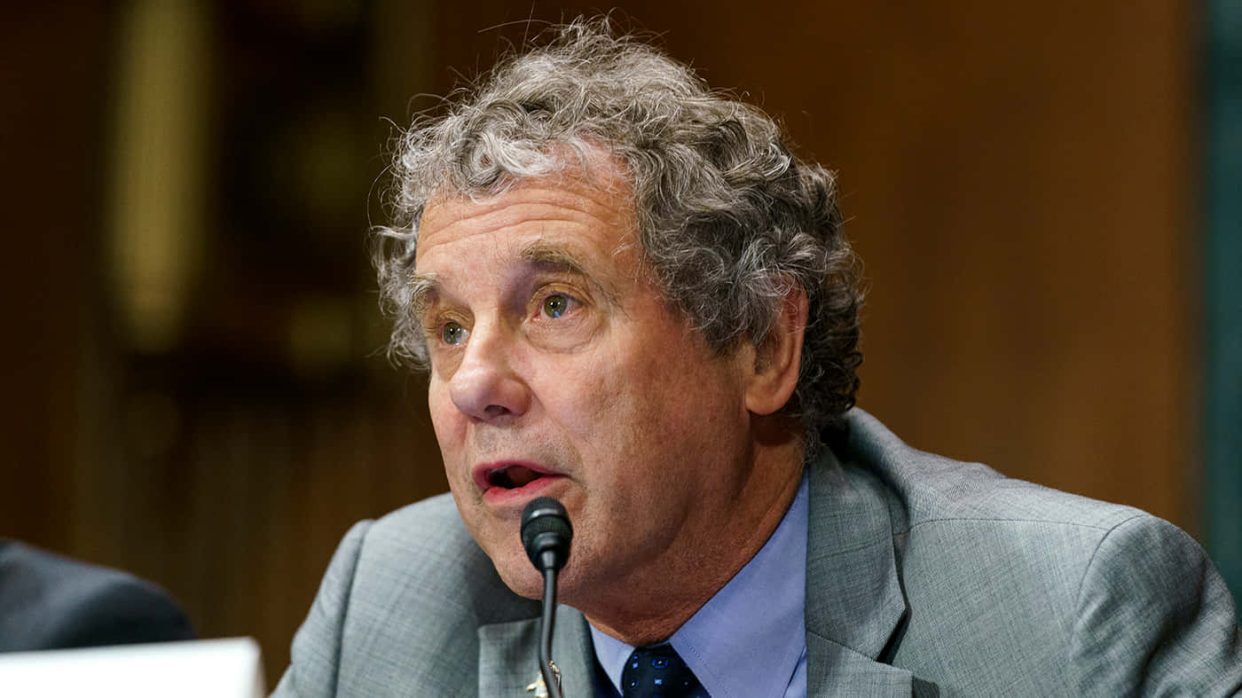 Sherrod Brown Asking Questions Background