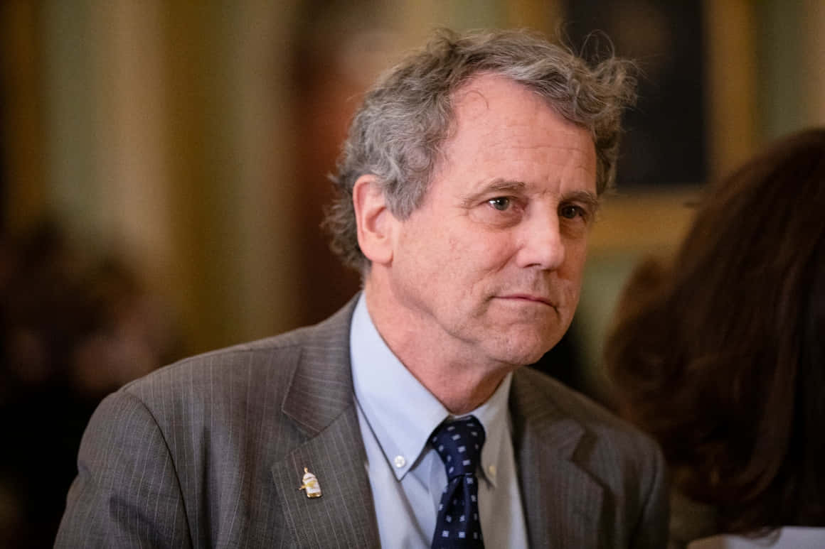Sherrod Brown In Capitol With Press Background