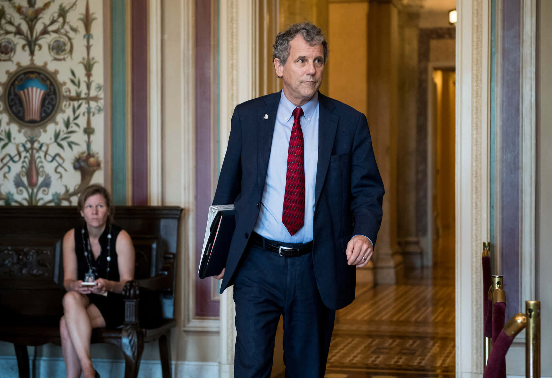 Sherrod Brown Walking Into Office Picture