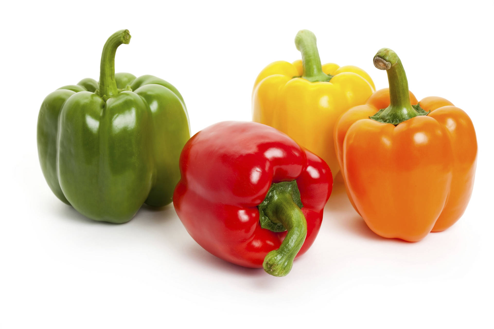 Shiny Green Red Yellow And Orange Capsicum Fruits Wallpaper