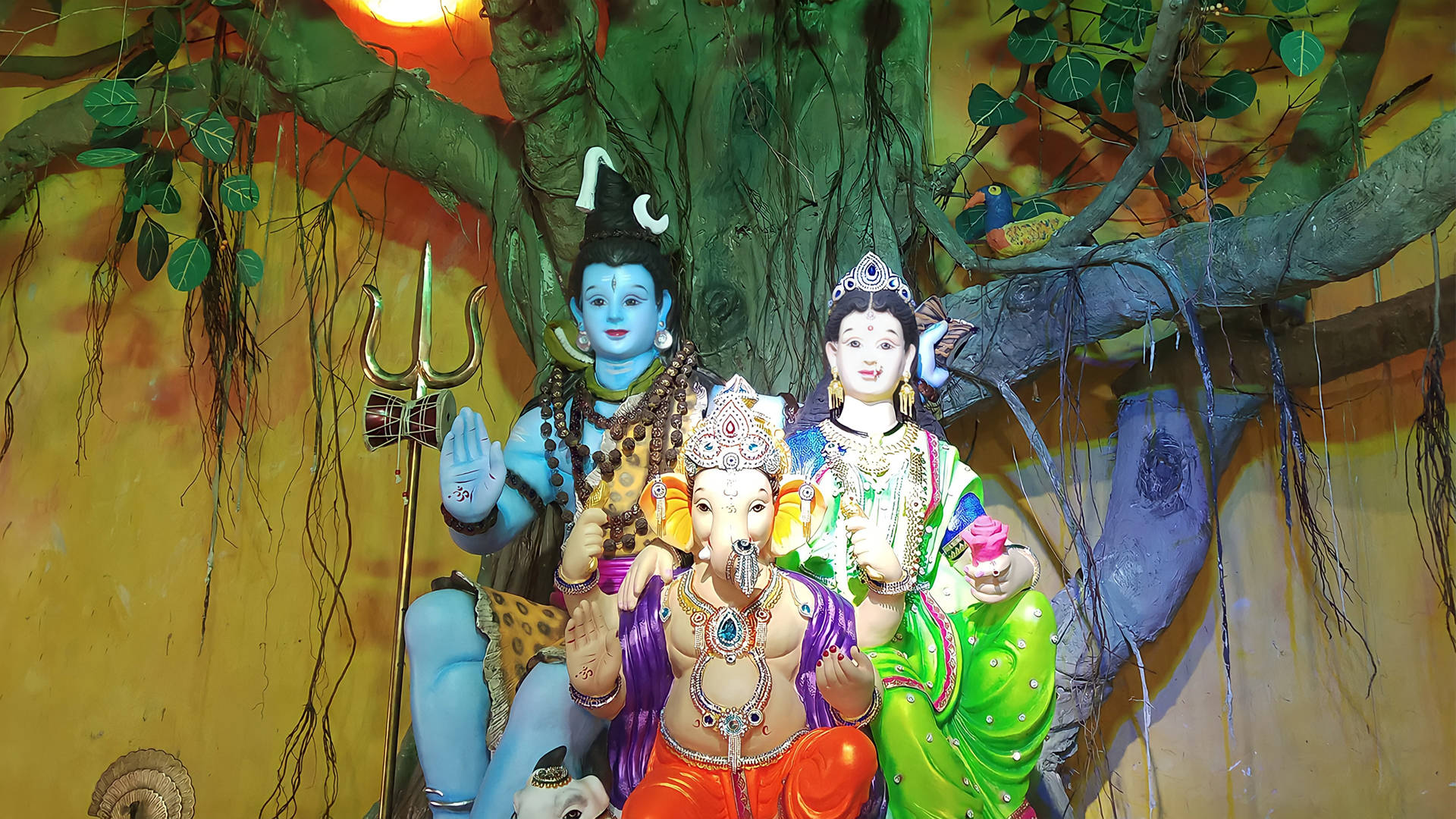 Download Shiv Parvati Hd Statues On Tree Wallpaper 