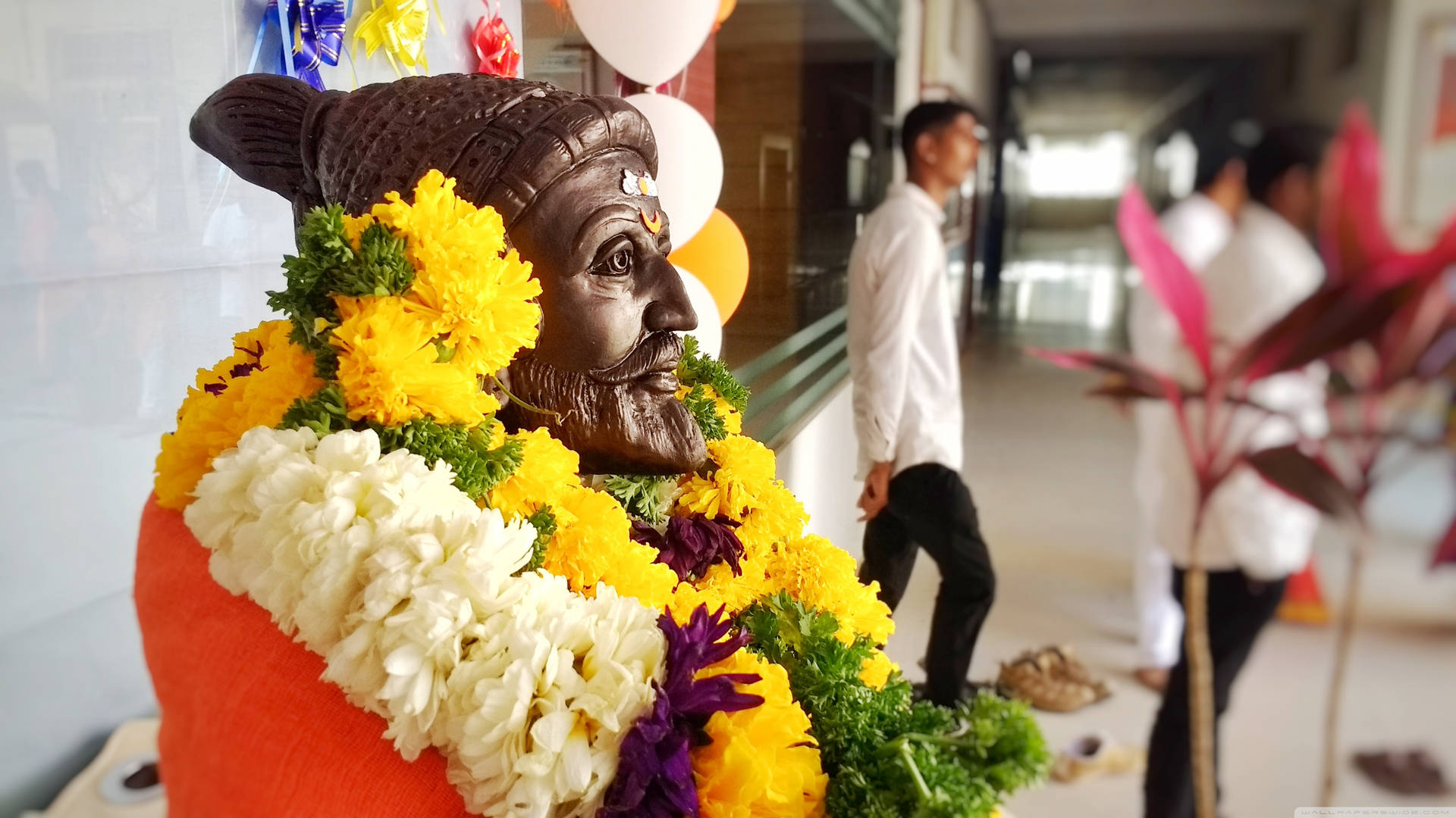 Shivaji Maharaj Statue With Flowers And Garlands Hd Wallpaper