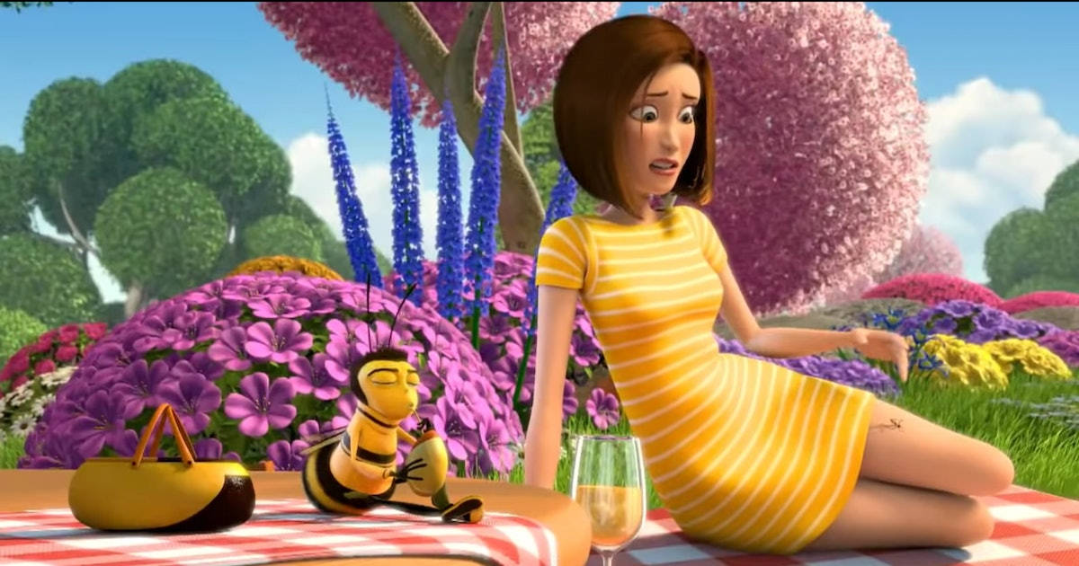 a girl in a yellow dress is sitting on a picnic blanket Wallpaper