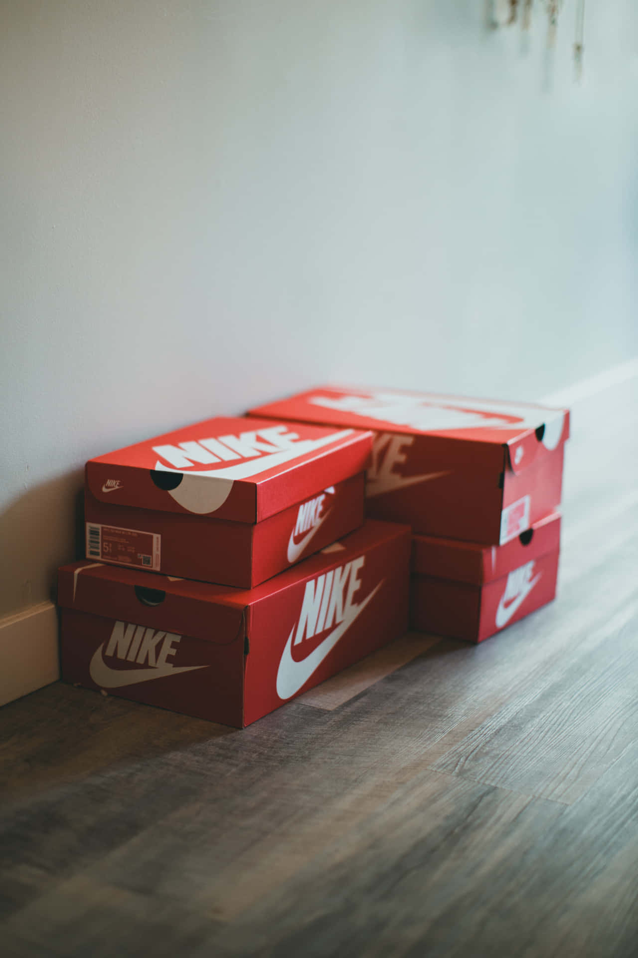 A Stack Of Nike Boxes Wallpaper