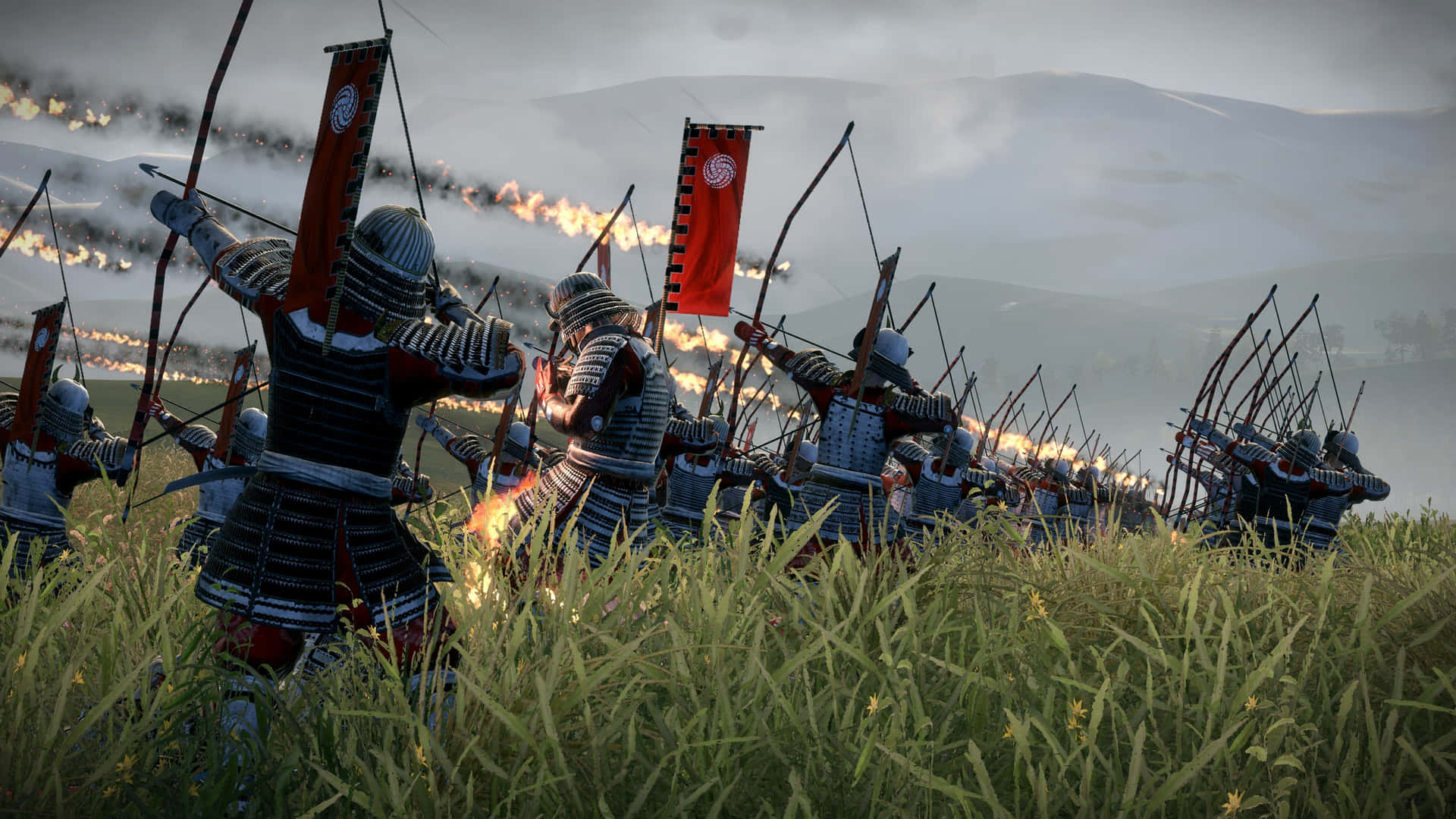 A Group Of Men In Armor Are Fighting In A Field Wallpaper