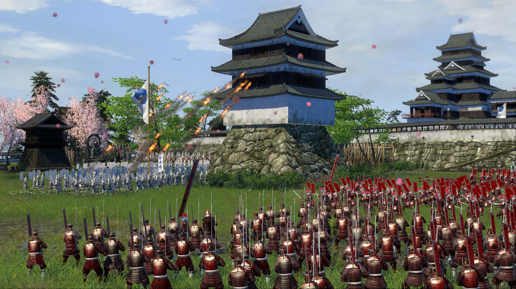 Et screenshot af et spil med mange soldater foran et slot Wallpaper