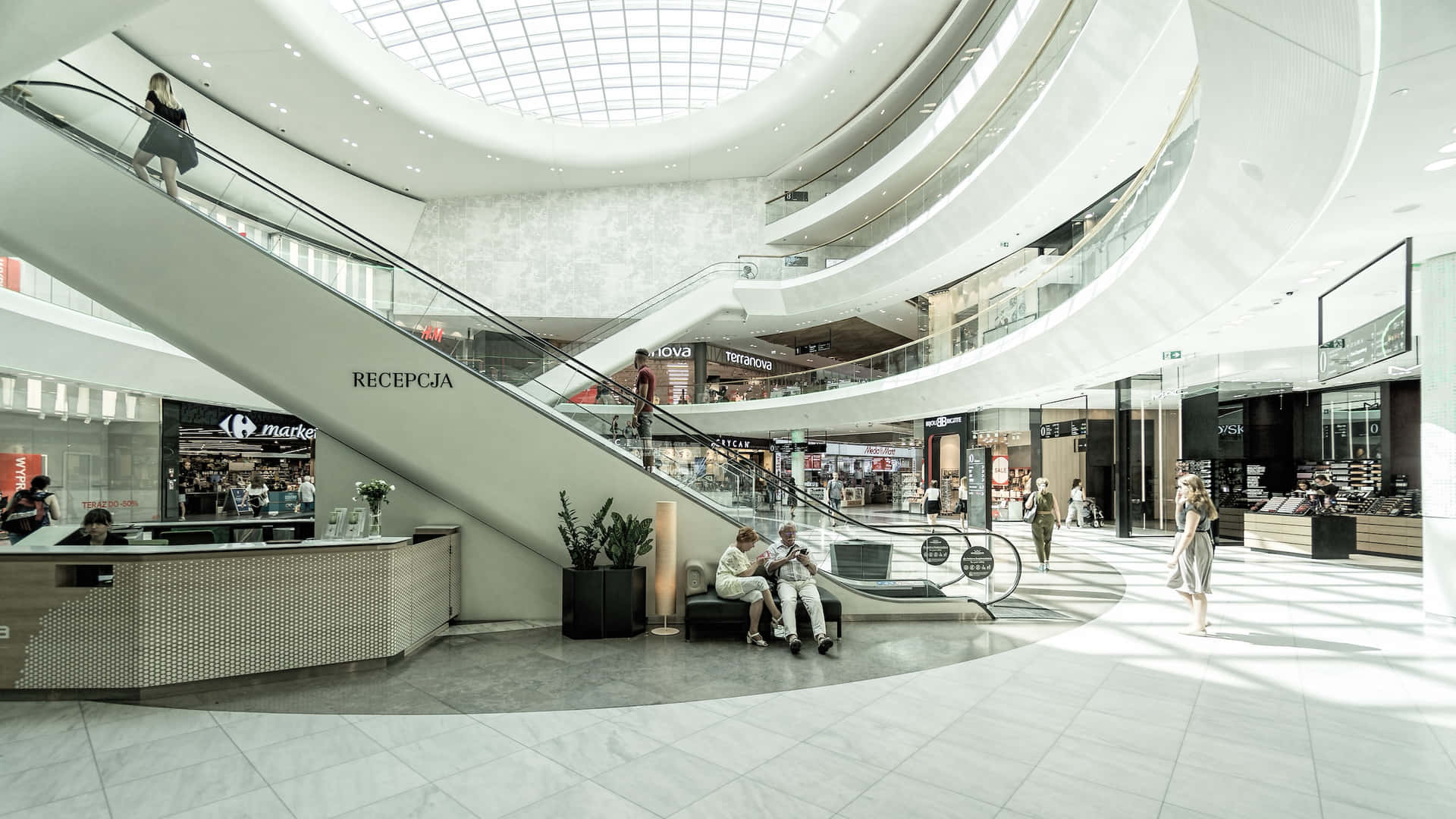 Vibrant and bustling shopping mall interior