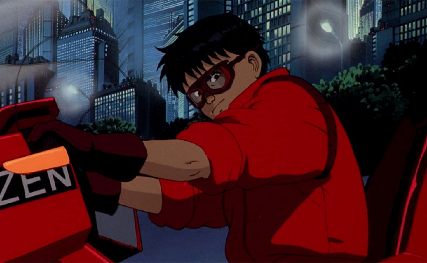 Shotaro Kaneda Riding His Iconic Motorcycle Against A Cyberpunk Cityscape. Wallpaper