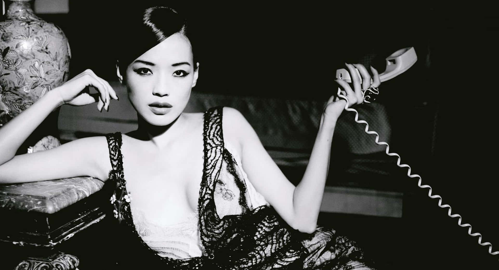 Shu Qi striking a pose in a stunning photoshoot Wallpaper