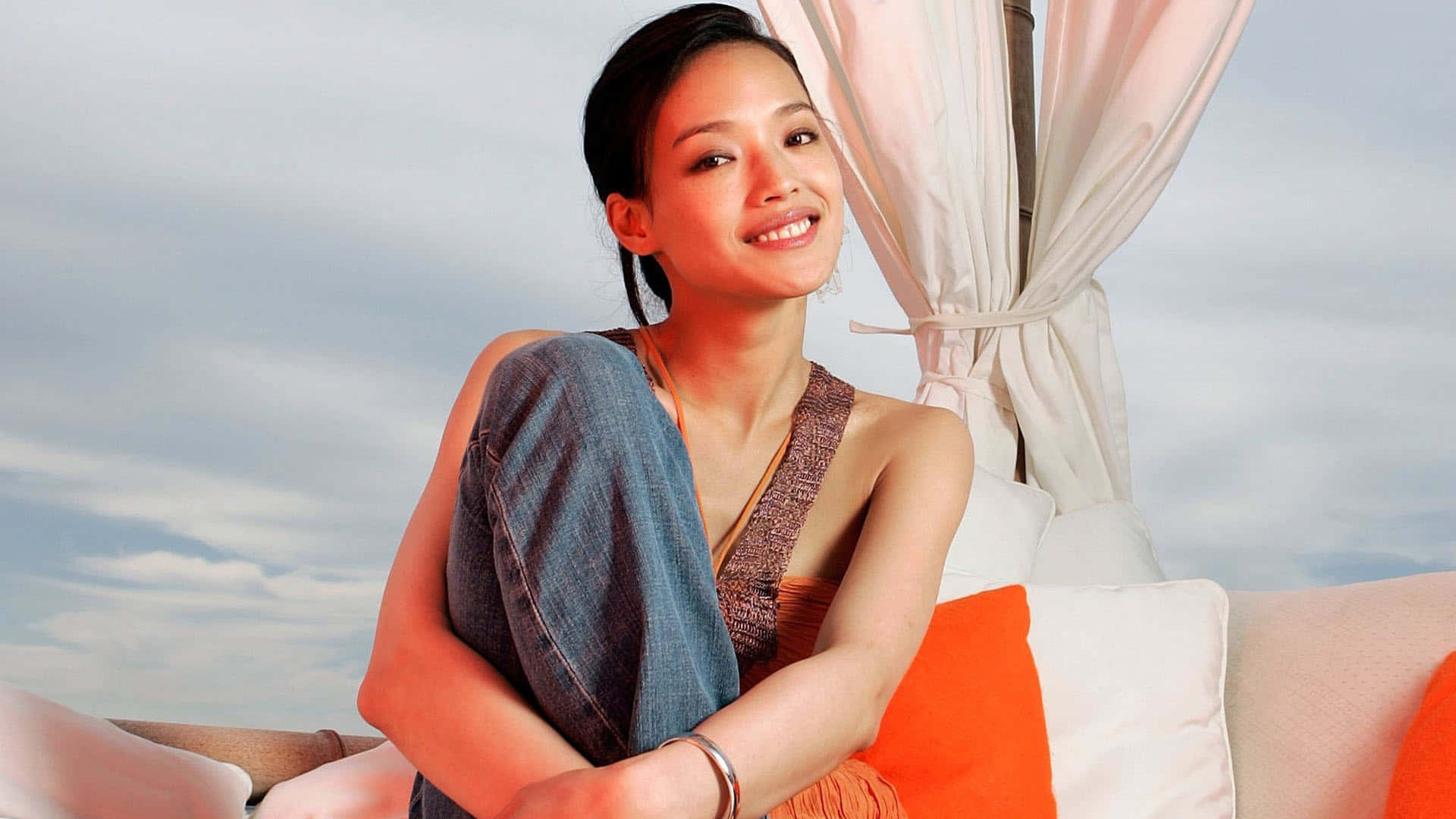 Shu Qi Posing Elegantly in Chic Outfit Wallpaper