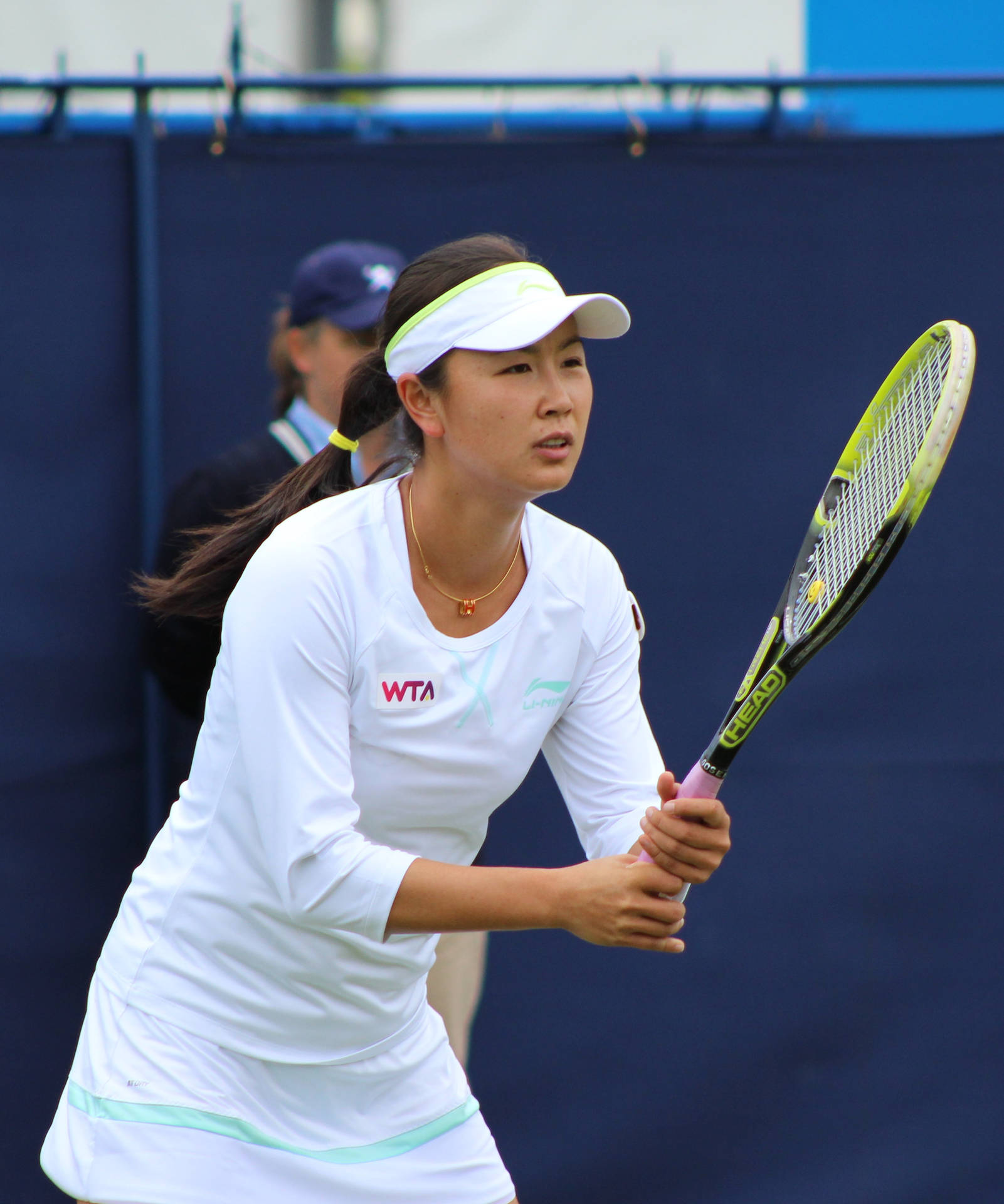 Shuai Peng Holding Racket Wallpaper