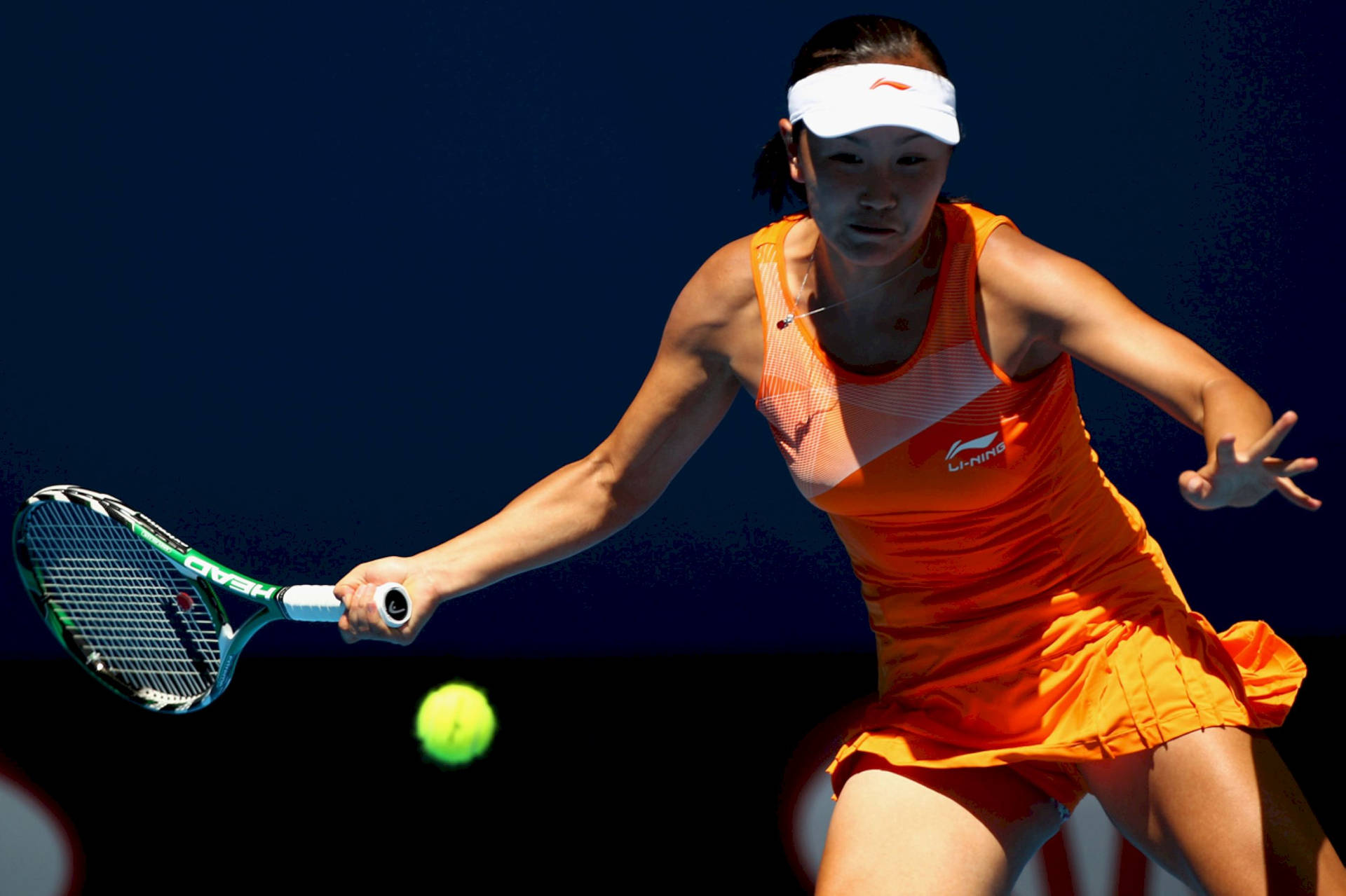 Shuai Peng In Orange Tennis Dress Wallpaper
