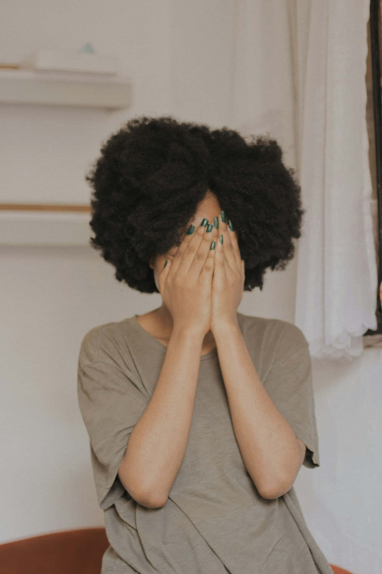 Shy Person Covering Face Wallpaper