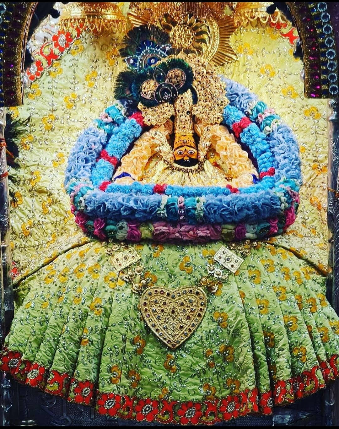 Shyam Baba With Blue Flower Garlands