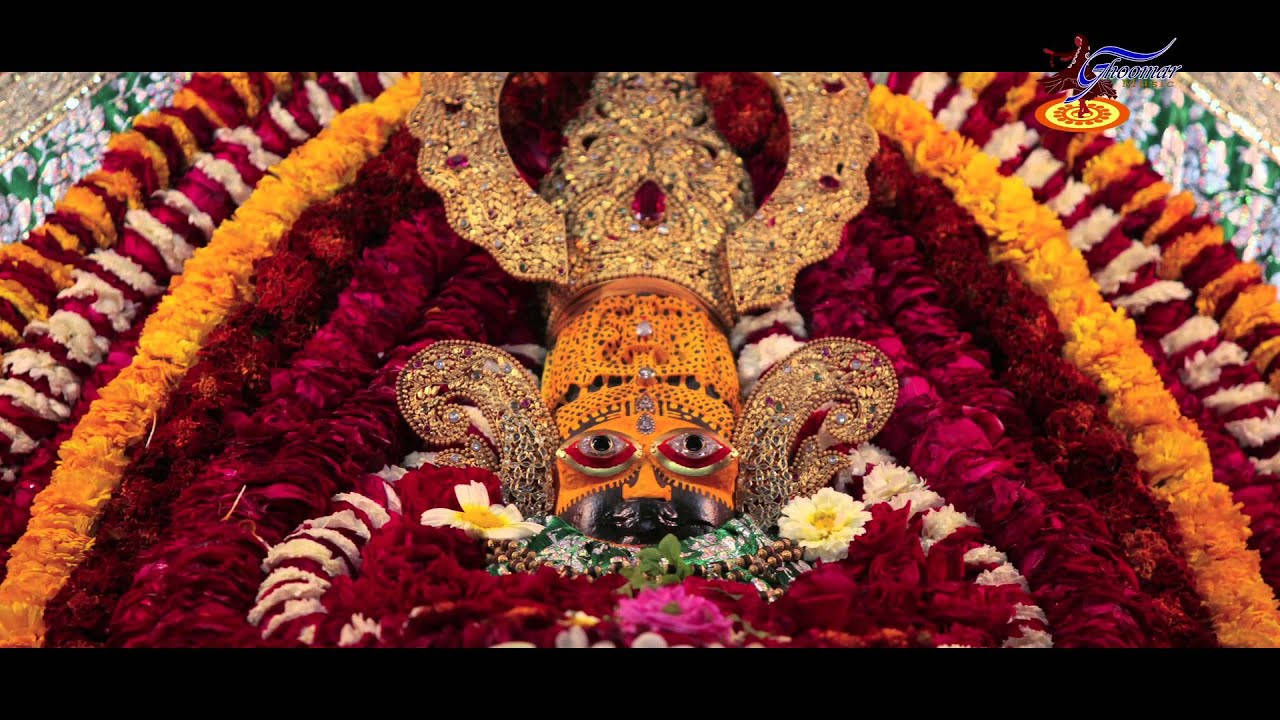 Shyam Baba With Red And Yellow Garlands