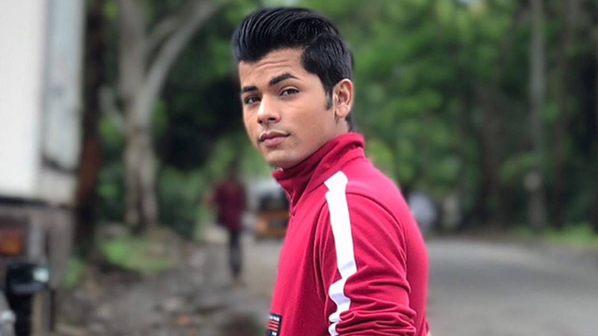 Download Siddharth Nigam Red Track Jacket Wallpaper 