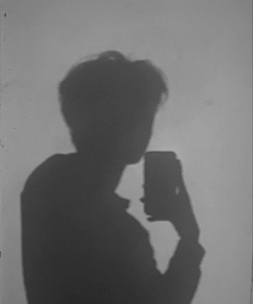 Side-View Boy Shadow Selfie Wallpaper