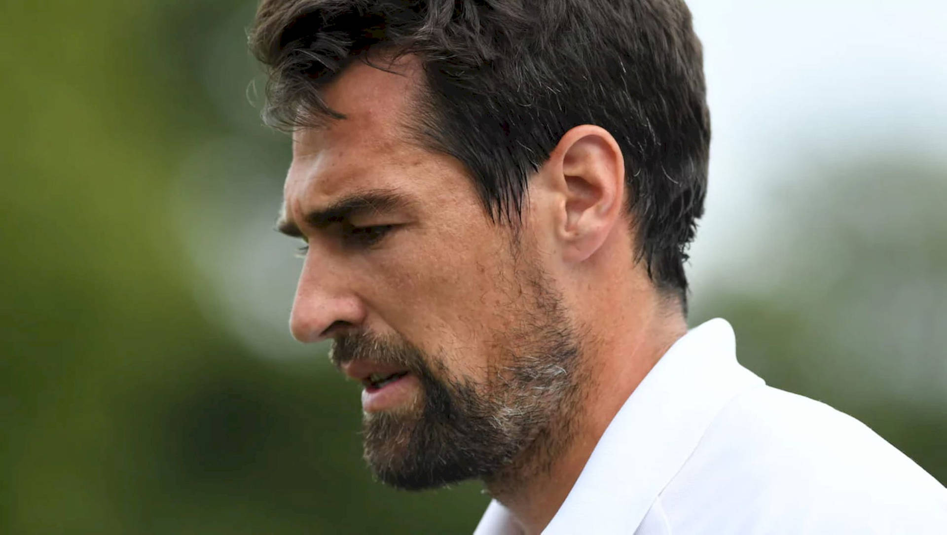 Caption: Intense Side Profile of Jeremy Chardy in Action Wallpaper