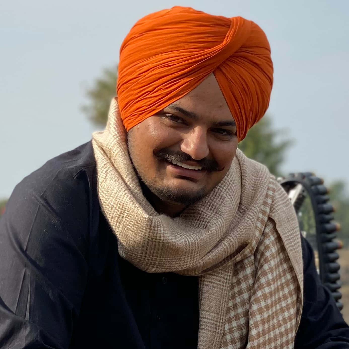 A Man In A Turban Smiling