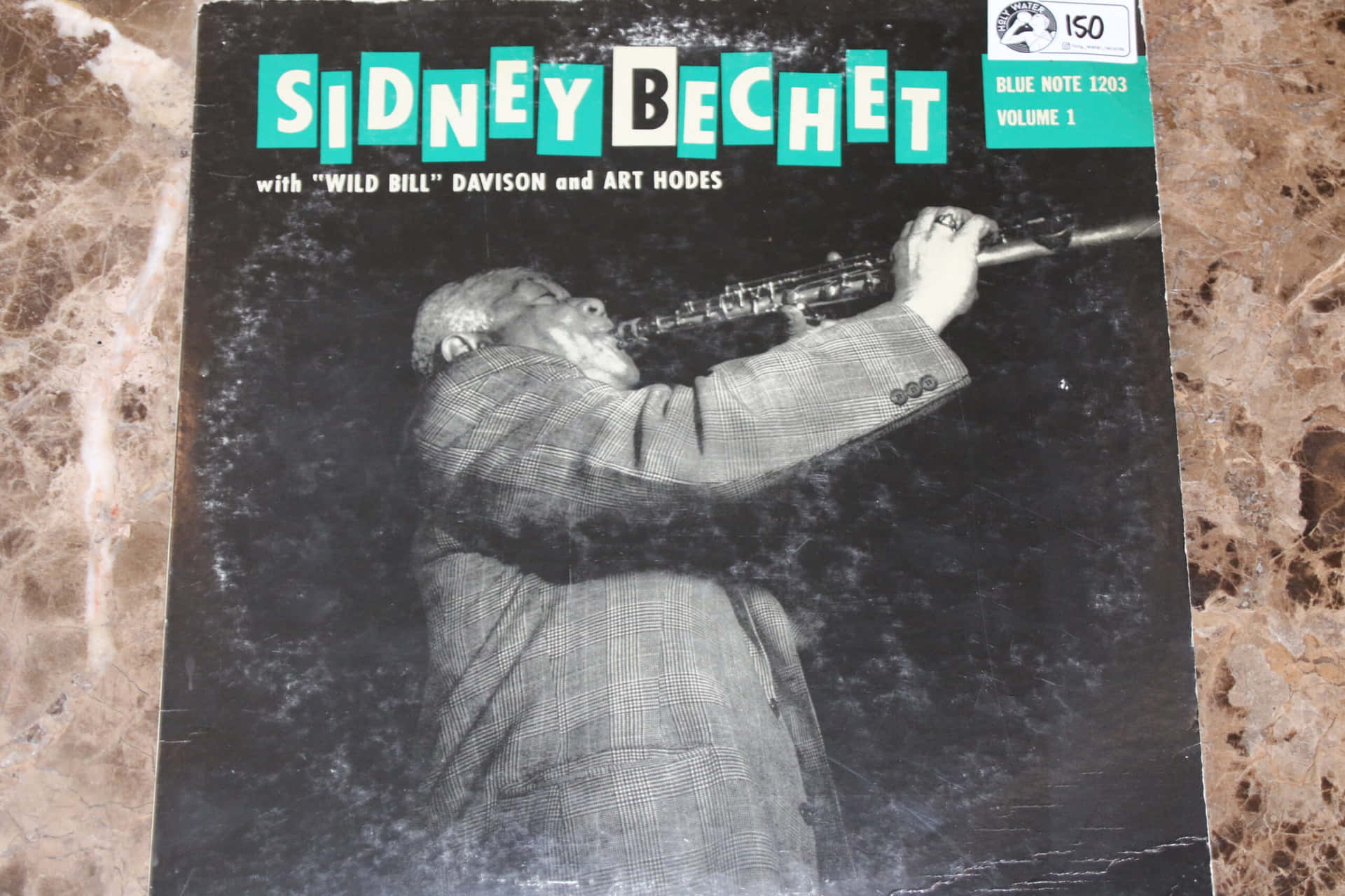 Sidneybechet, Gigante Del Jazz En La Portada. Fondo de pantalla