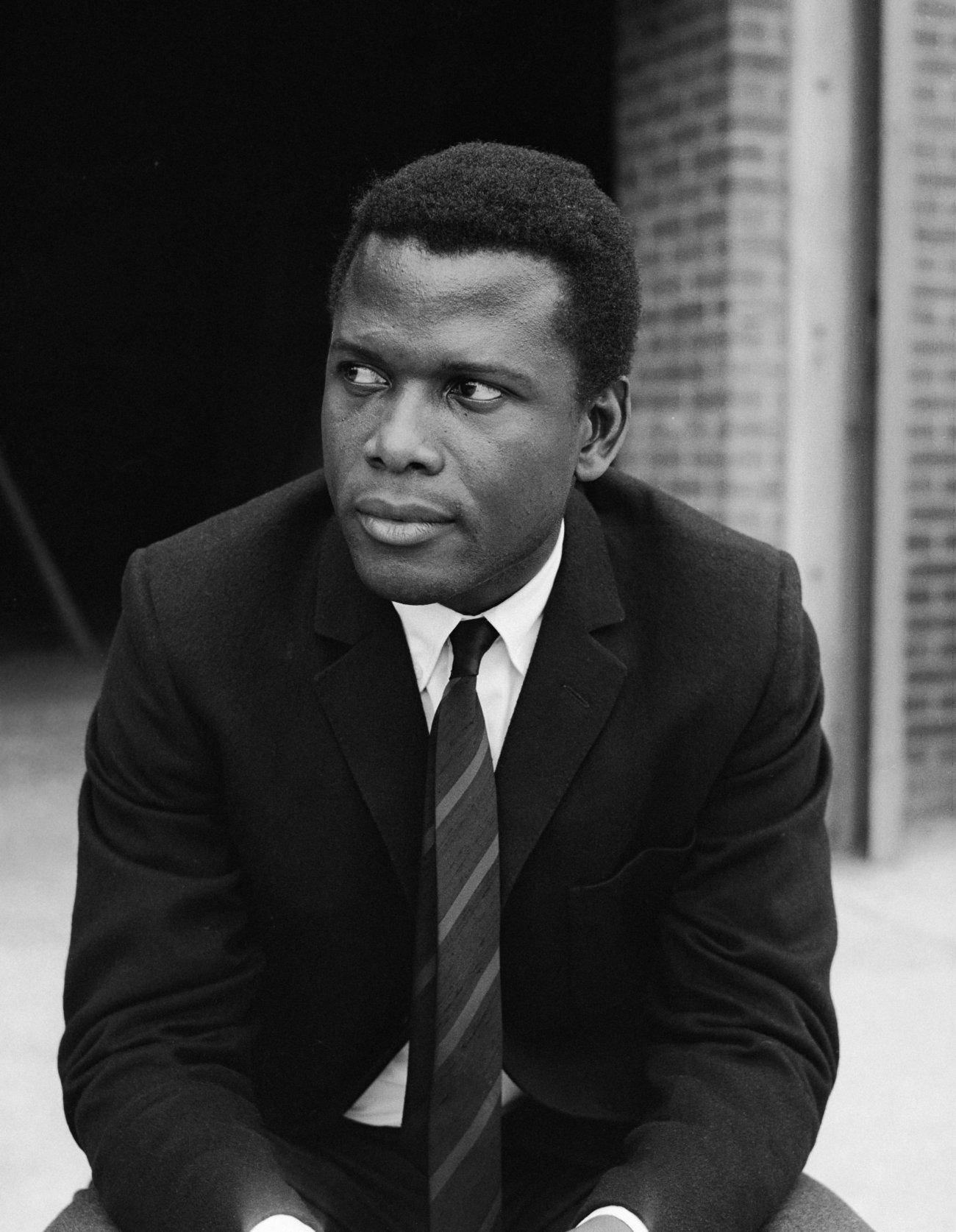 Iconic American actor, Sidney Poitier in one of his magnificent acting moments. Wallpaper
