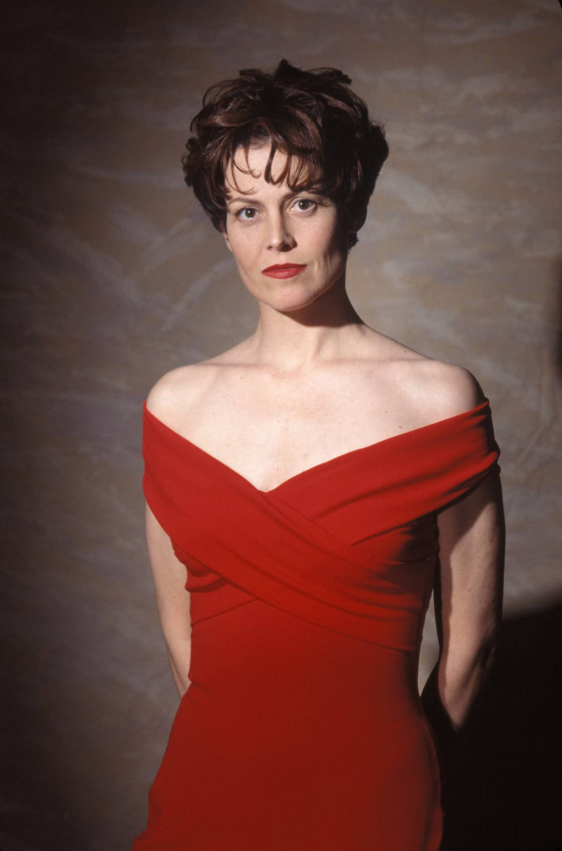 Sigourney Weaver Daring Red Dress Wallpaper