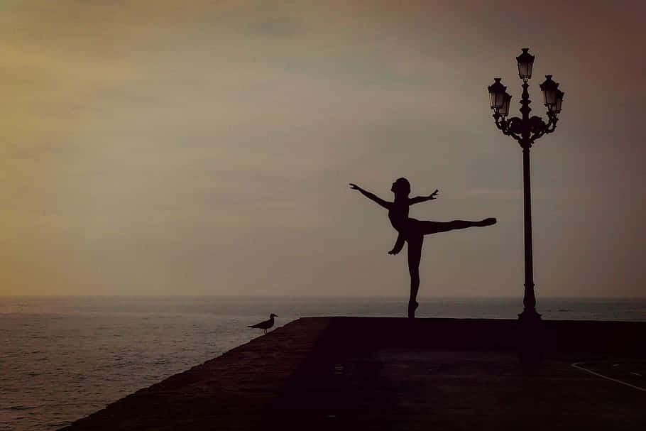Silhouette Ballet Dancer Seaside Sunset Wallpaper