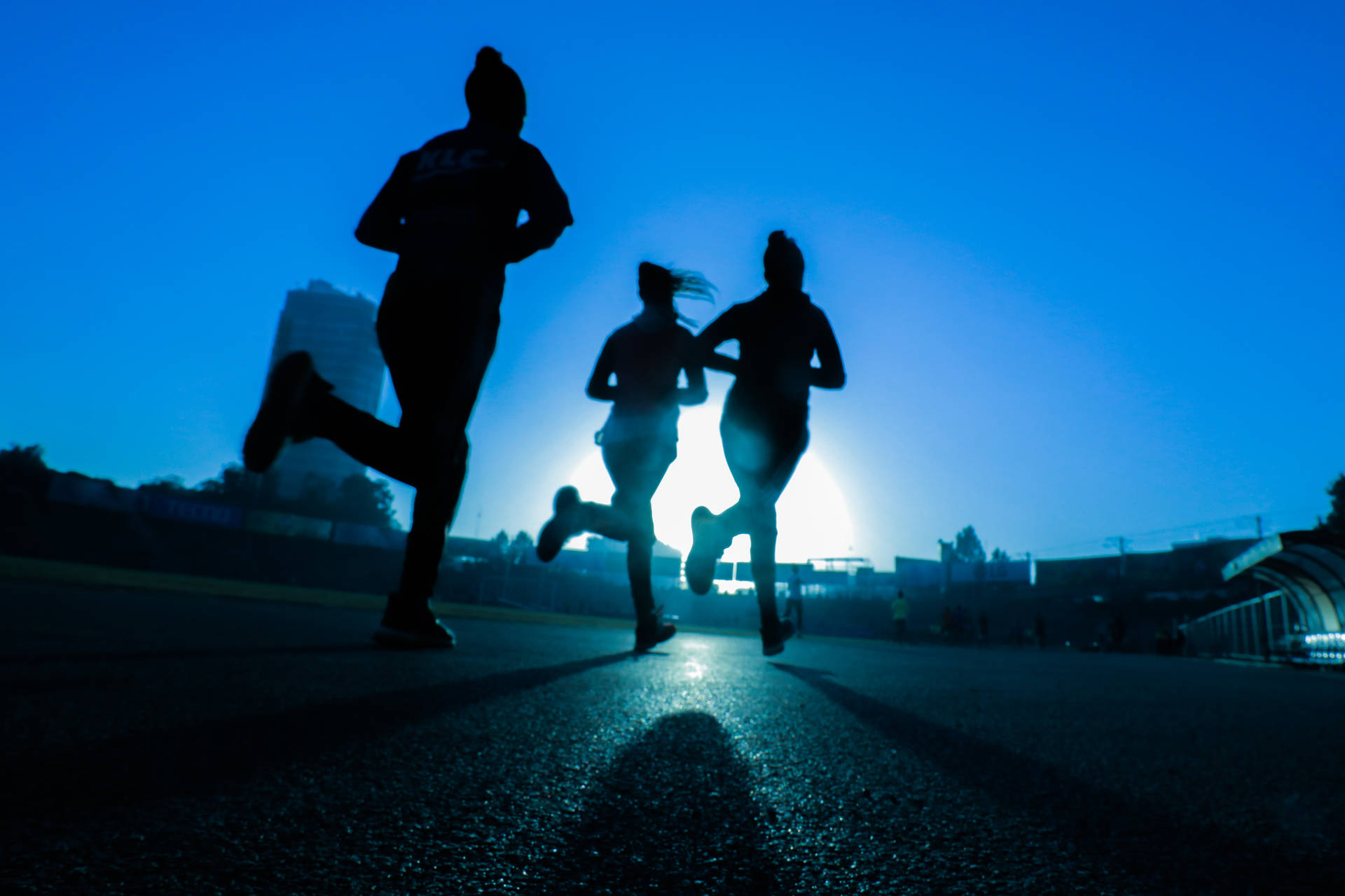 Silhouette Of Fitness Runners