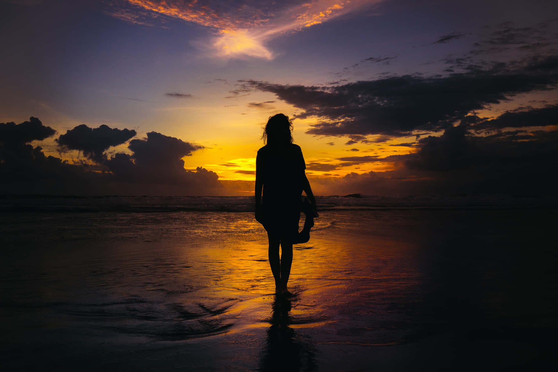 Silhouette Of Girl On Beach's Beautiful Sunset Wallpaper
