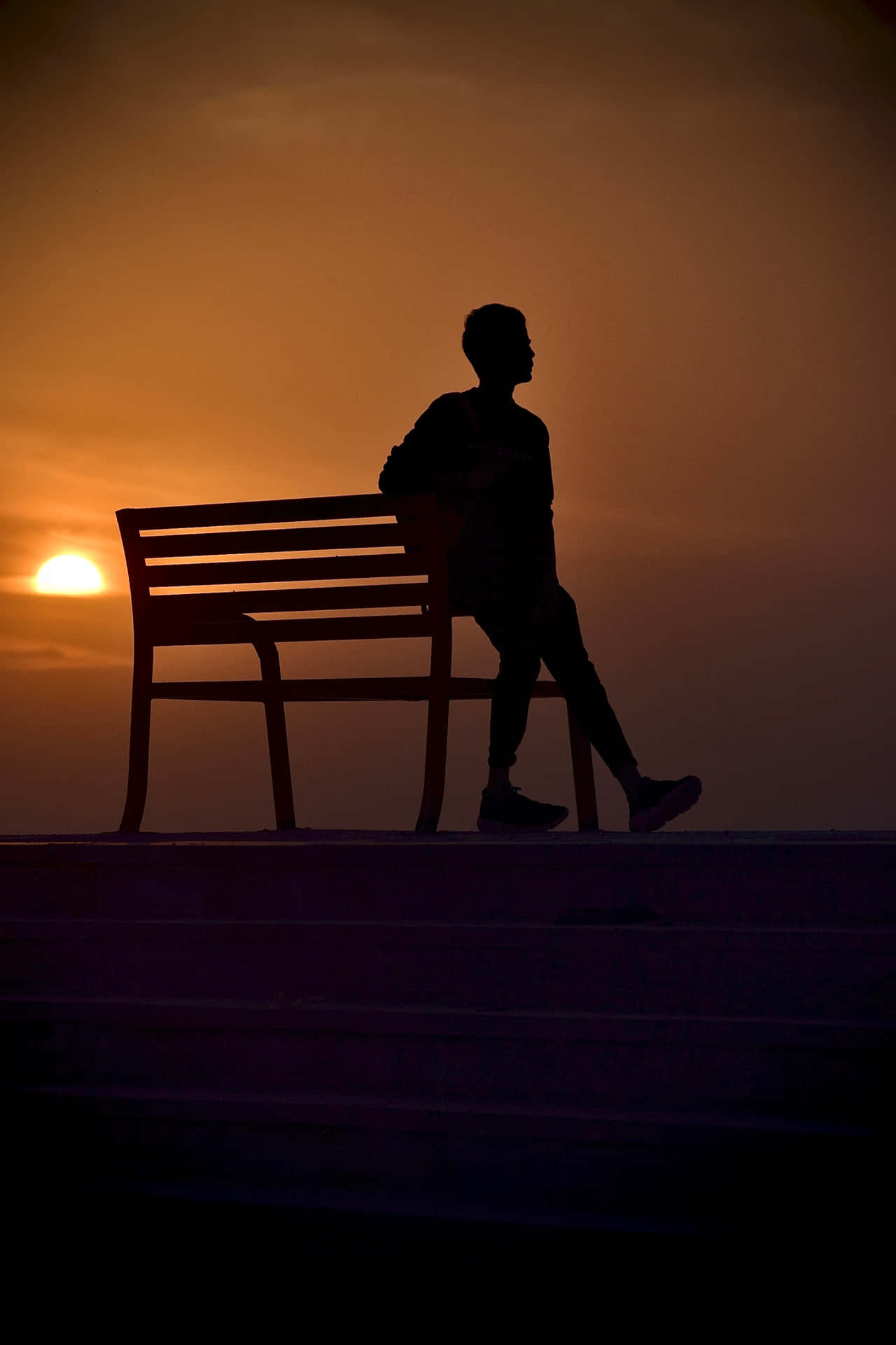 Silhouette Sunset Leaningon Bench Wallpaper