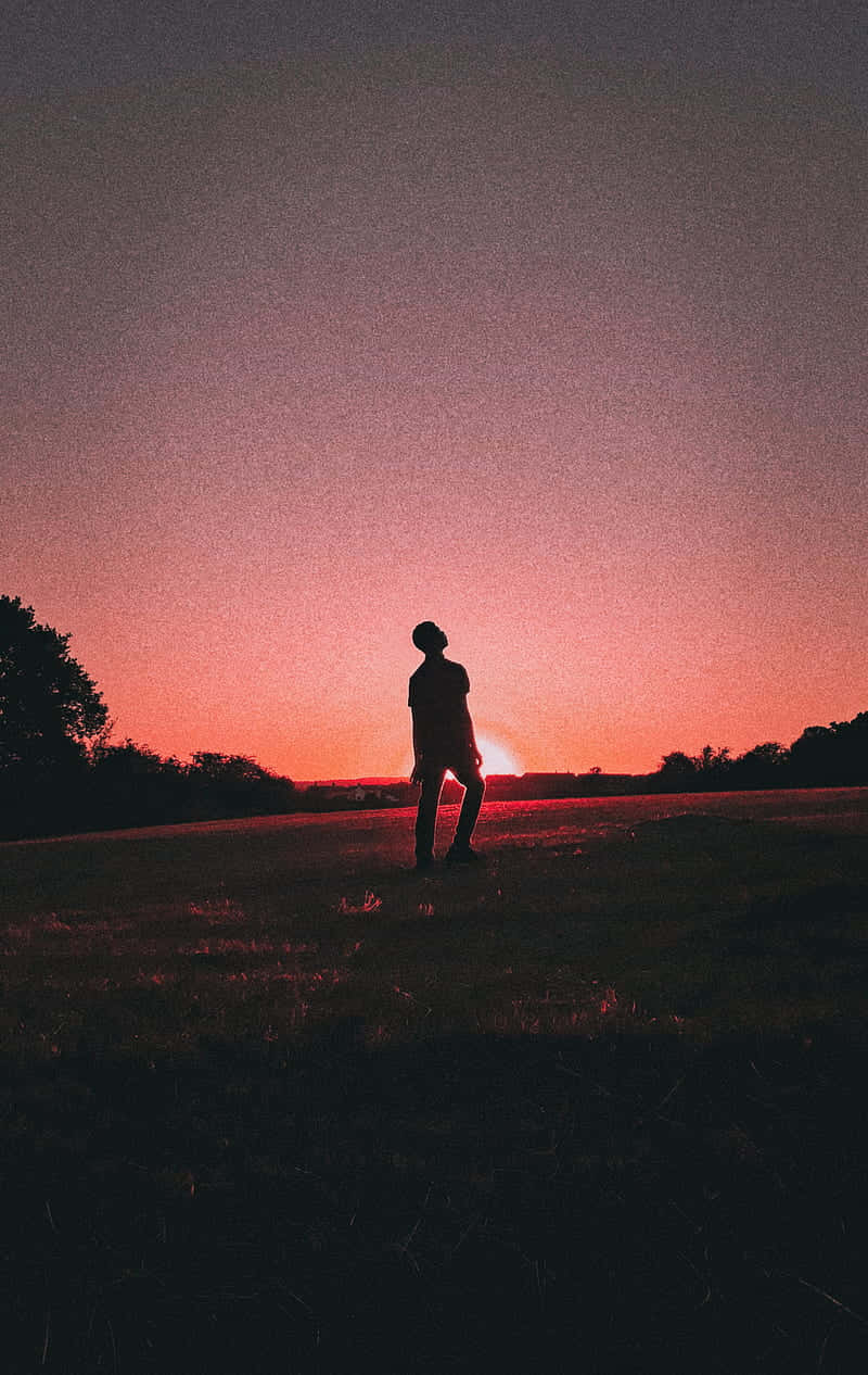 Silhouette Teenager Sunset Contemplation.jpg Wallpaper