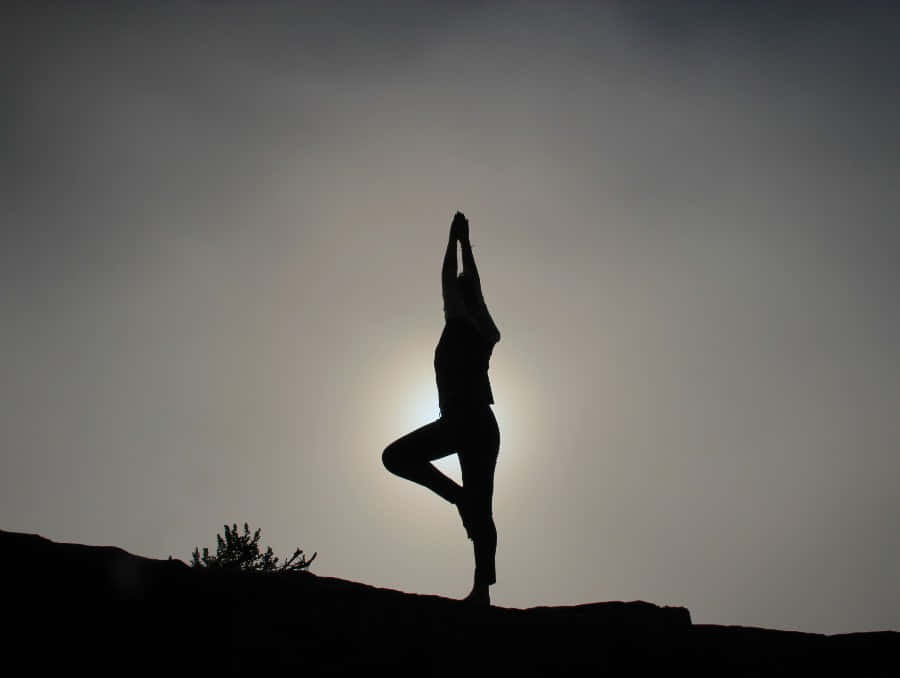 Silhouette Yoga Pose Sunset Wallpaper