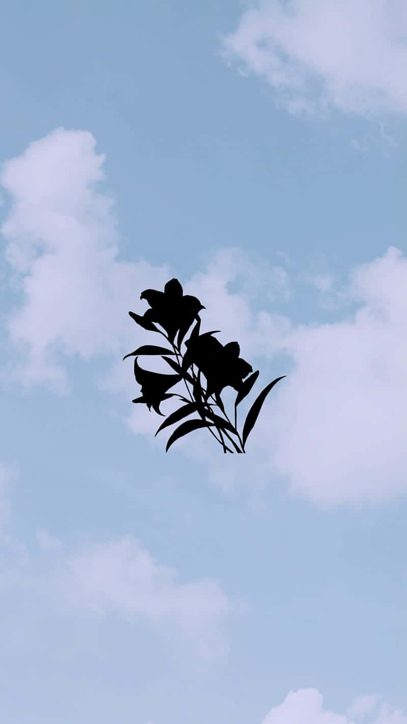 Silhouetted Flora Against Sky Wallpaper