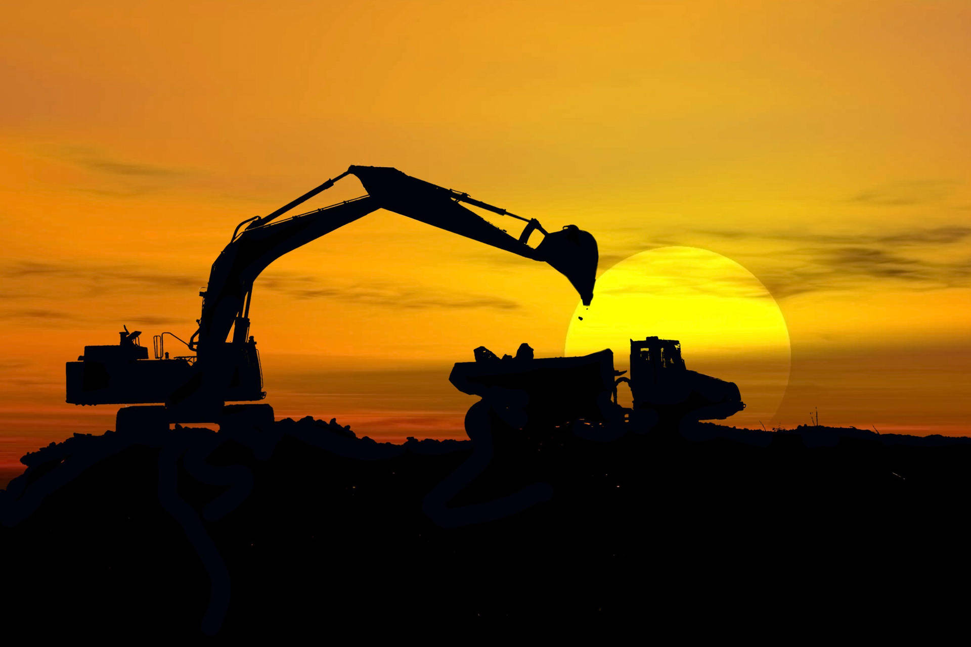 Silhouetted Heavy Construction Machinery Wallpaper