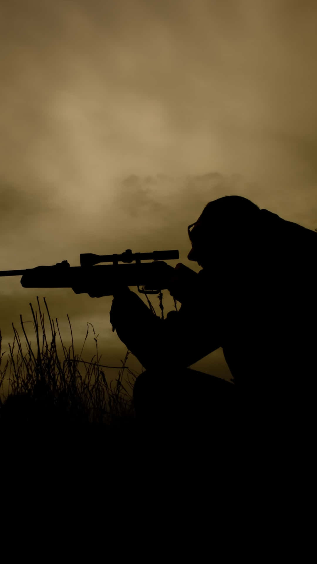 Silhouetted_ Sniper_at_ Dusk Wallpaper