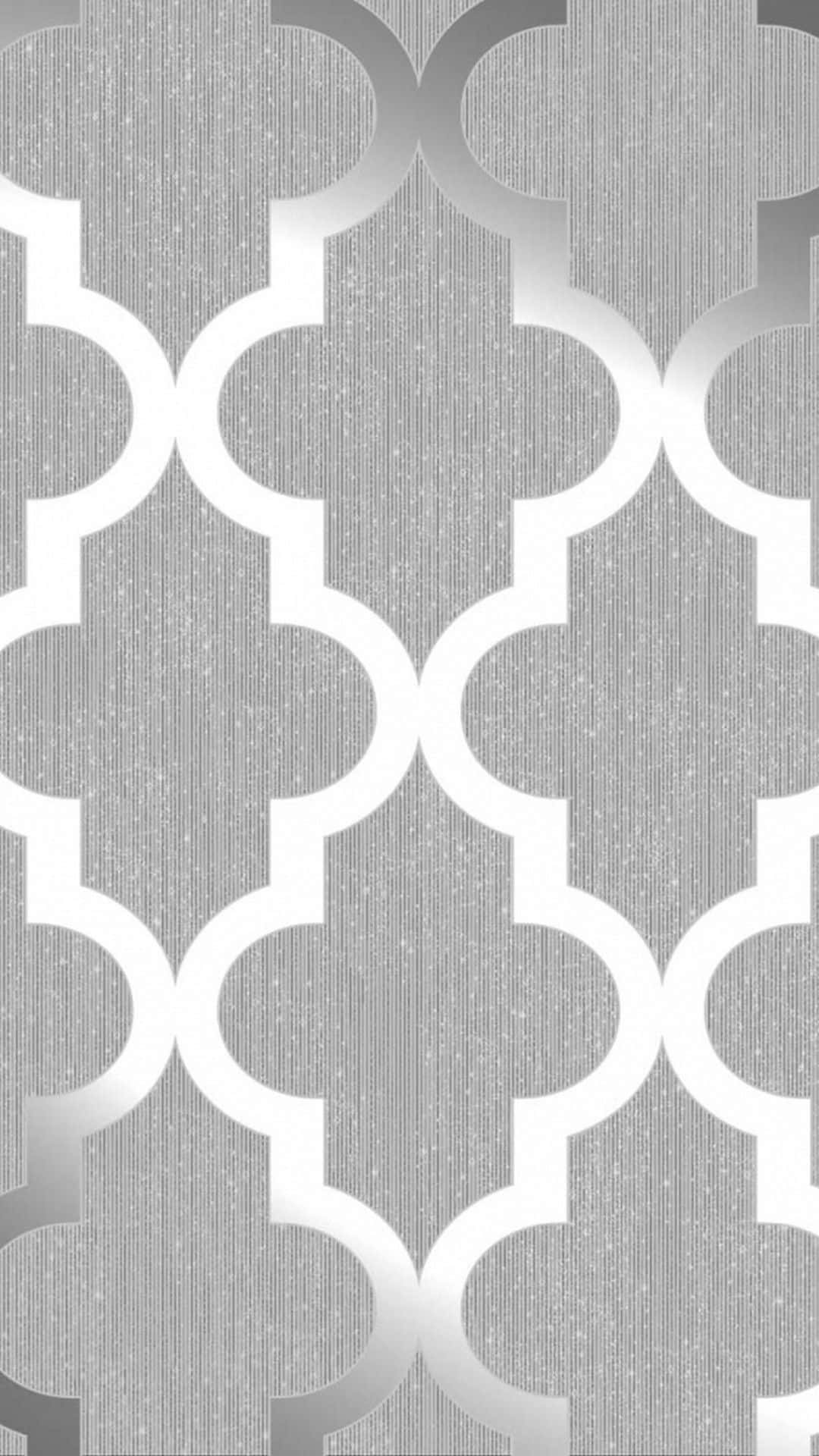 A Silver And White Wallpaper With Geometric Designs Wallpaper
